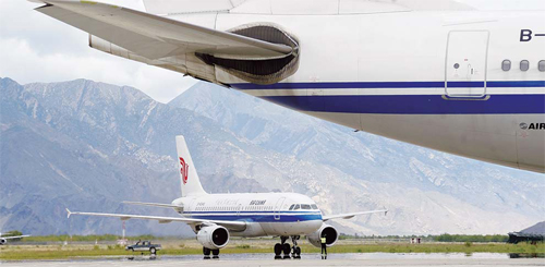 An aircraft is inspected at Gonggar Airport, Lhasa