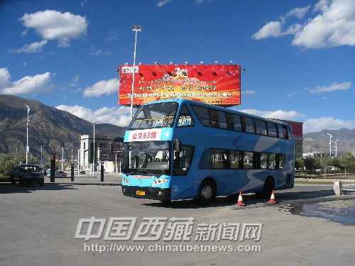 The double-deck sightseeing bus is ready to run at the Lhasa Public Transport Terminal in Lhasa, capital city of southwest China's Tibet Autonomous Region (TAR)