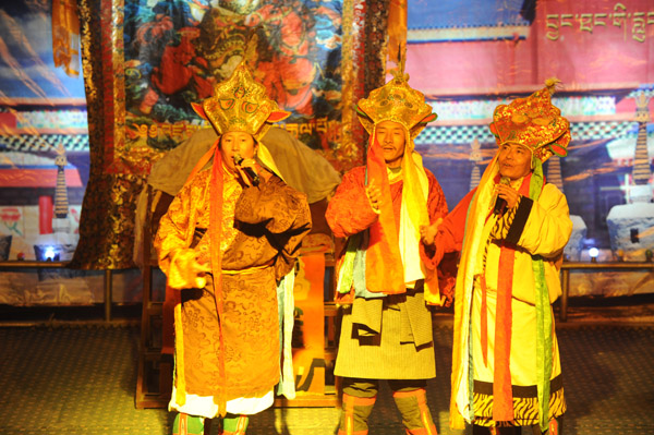 File photo from http://www.chinatibetnews.com/ shows folk artists from Nagqu Prefecture in the north of Tibet Autonomous Region narrating the "Epic of King Gesar".