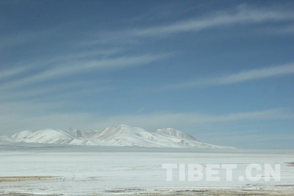View of snow-covered Qinghai-Tibet plateau, captured by Kelzang Metok on Train T27 departing from Beijing.