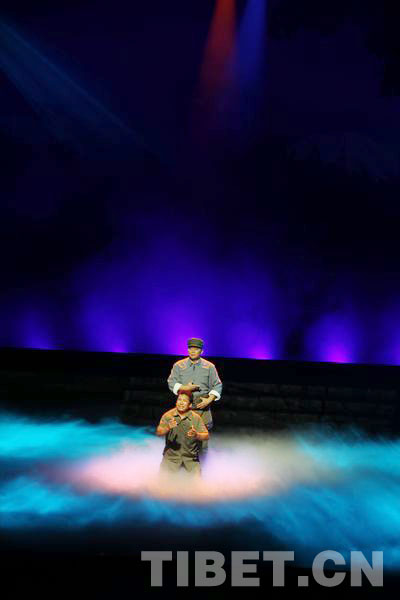 Artists perform in the Tibetan opera titled "Golden Homestead" in the National Threater of China, Beiing, July 2, 2012.