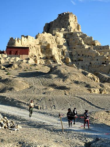 Tourists are visiting the Ruins of Guge Kingdom. Located at an elevation of 4,500 meter in Zanda County of the Tibet Autonomous Region, the Ruins of Guge Kingdom is reputed as "the Roof of the World’s Roof". Established in around the 10th century, the Guge Kingdom was founded by one branch of a nearby fallen kingdom. [Photo/ Xinhua]