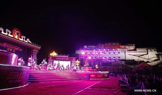 Performers sing and dance at the opening ceremony of Shoton Festival in Lhasa, capital